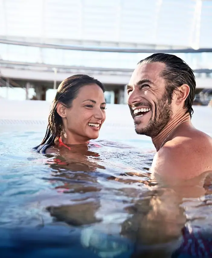 freshwater pool hot tub couple smiling